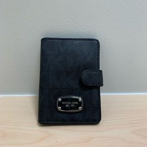 Petite Michael Kors wallet.